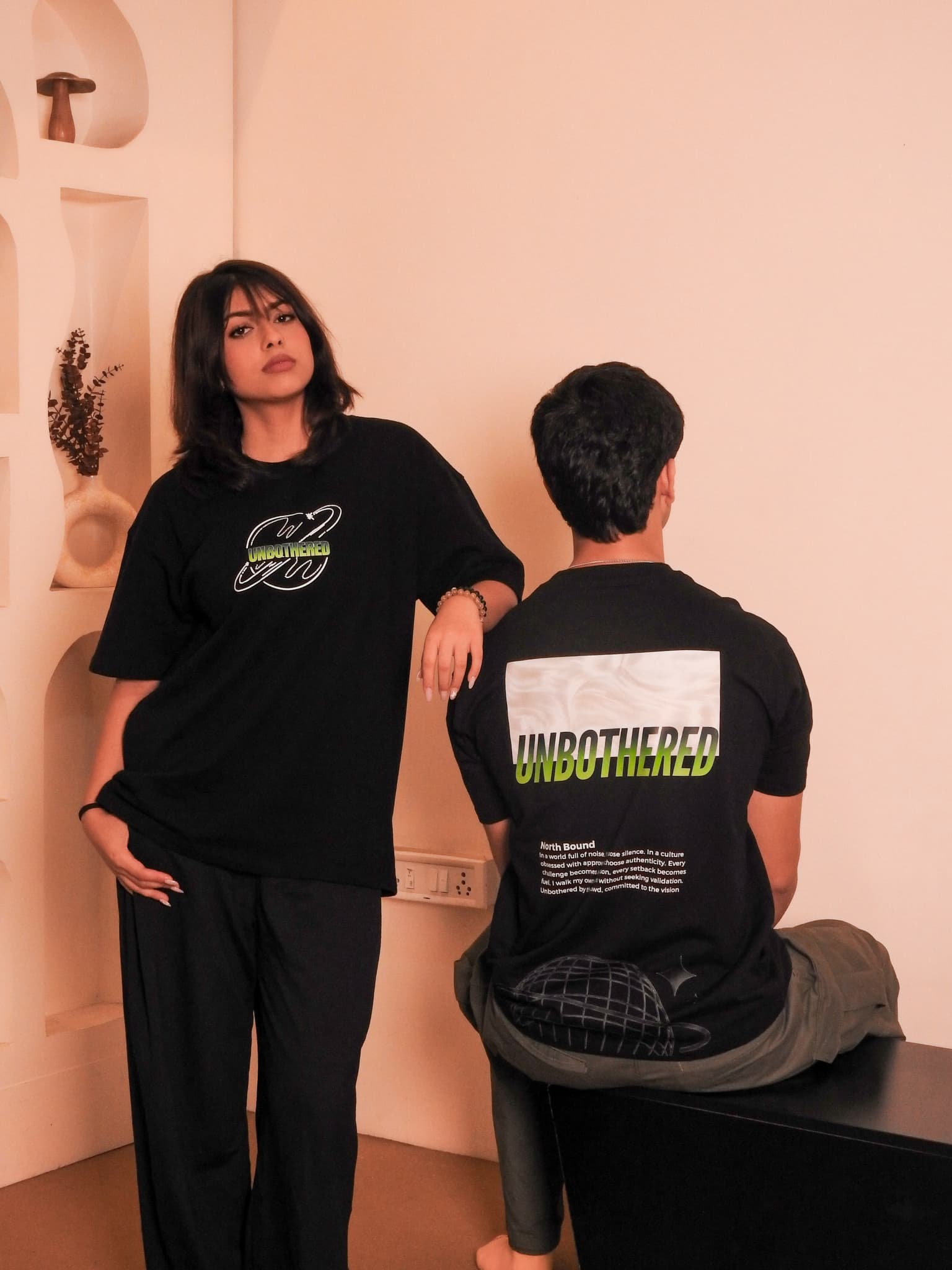 Unbothered tee front and back on two models